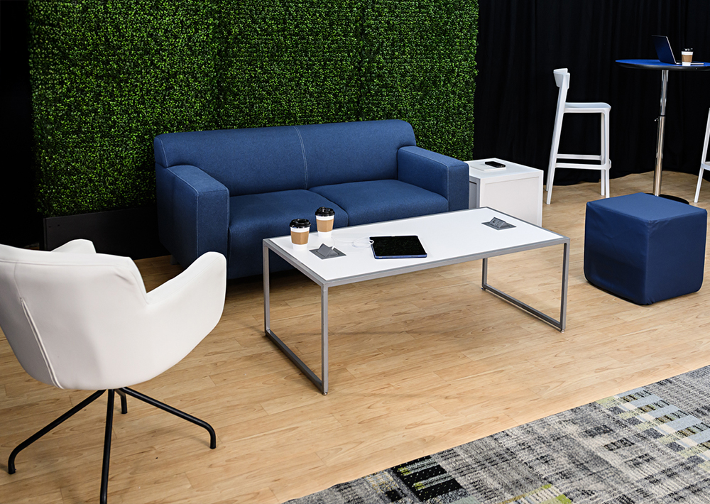 blue soft seating with white tables