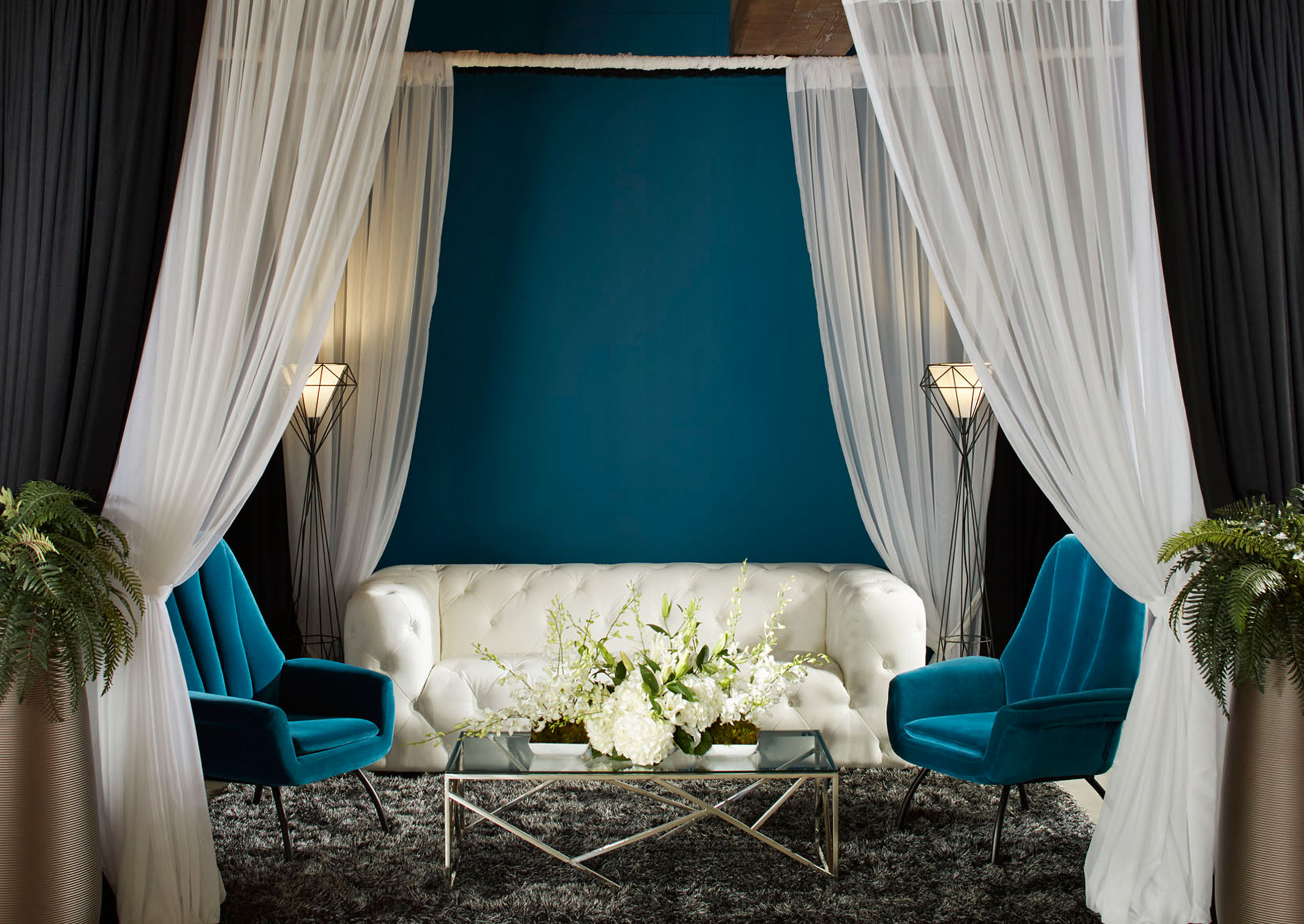 Event with white and teal furniture